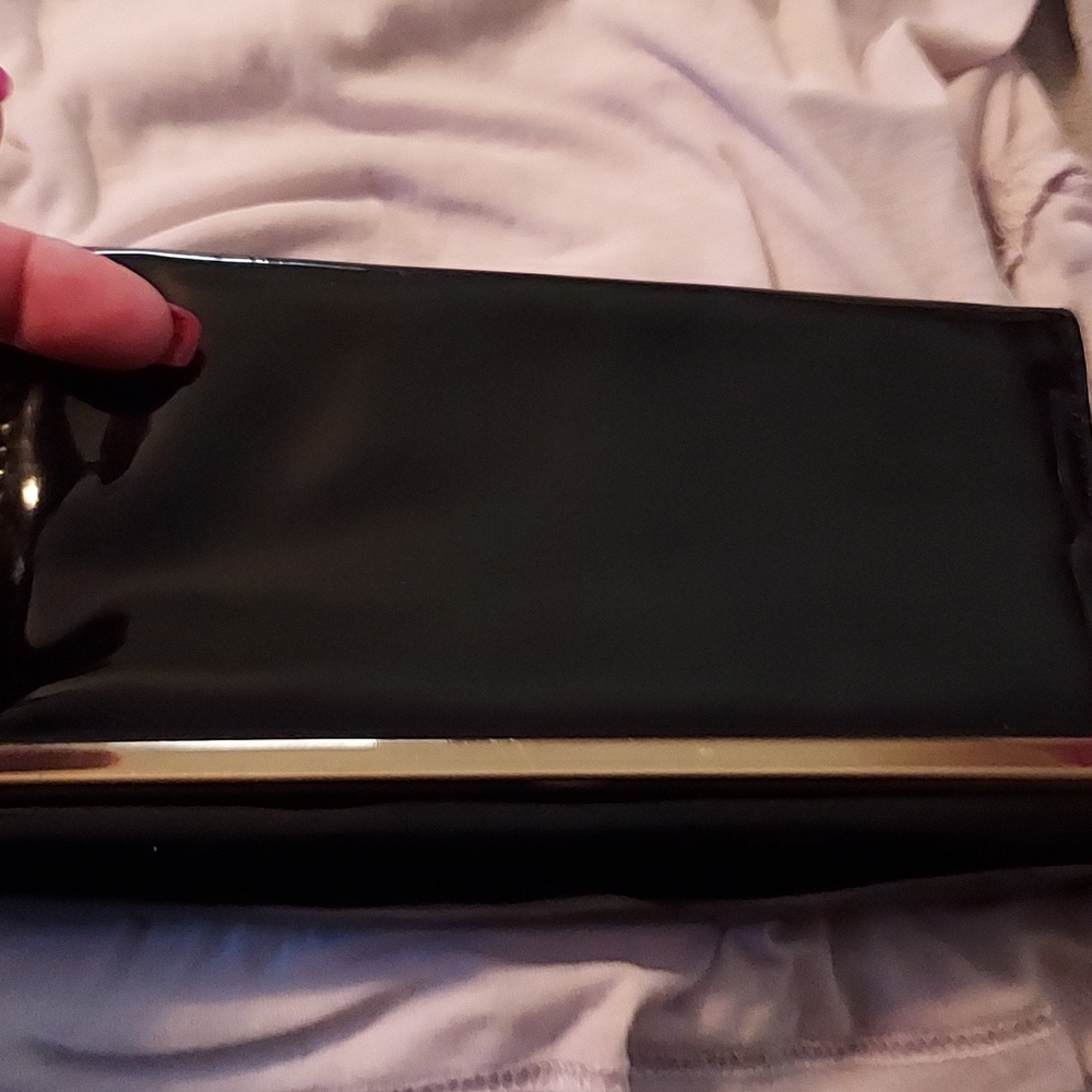 Black with gold trim purse 8"x5"